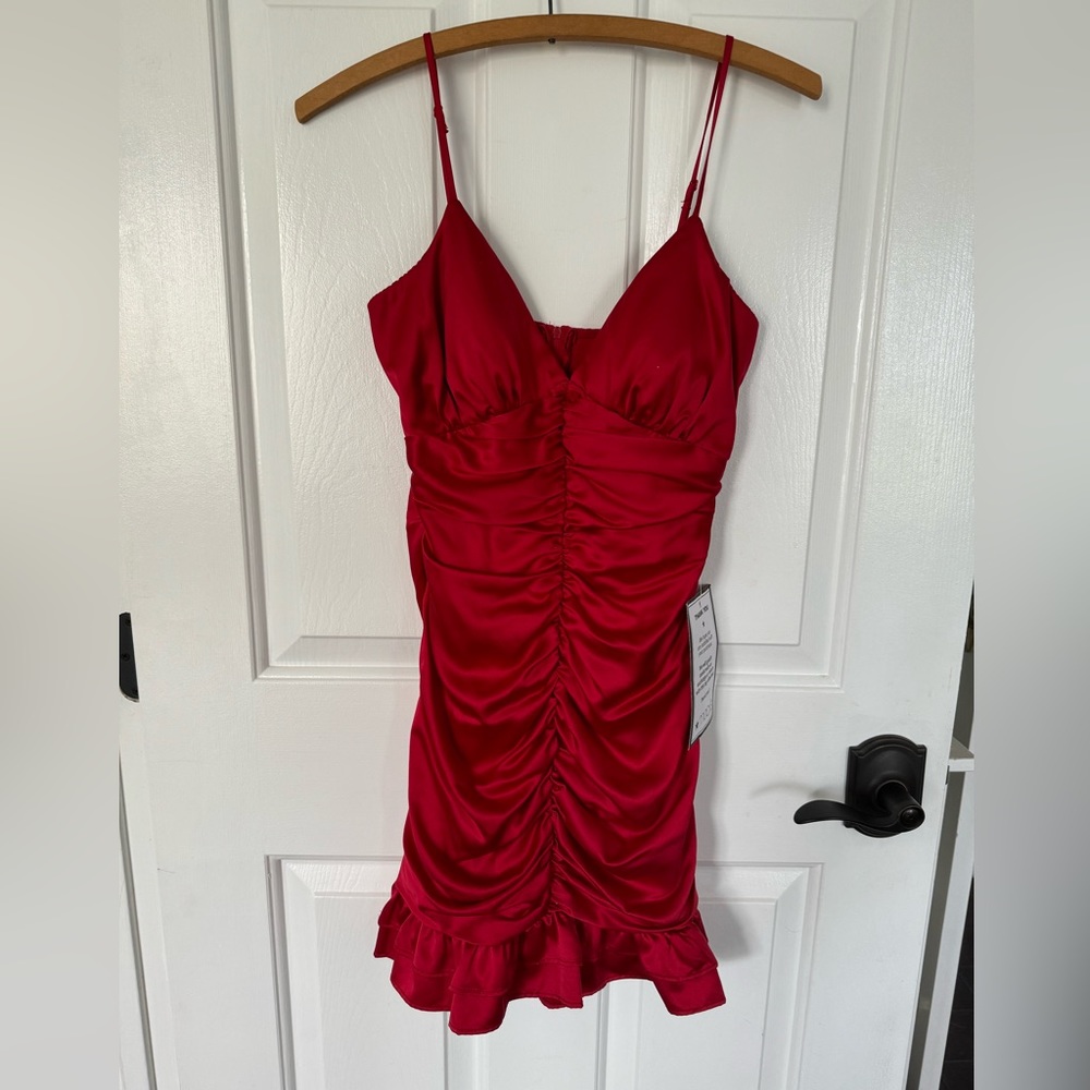 Red ruched mini dress.
